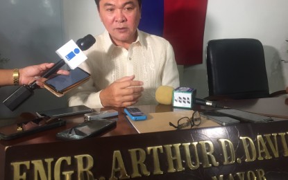 <p><br /><strong>DISASTER PREPAREDNESS.</strong> Magsaysay town Mayor Arthur Davin emphasizes the importance of vehicles and other equipment to help villages prepare better for calamities and disasters during an interview here on Monday (July 28, 2019). <em>(Photo by Che Palicte)</em></p>