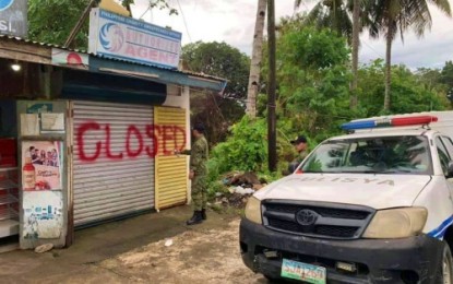 <p><strong>CLOSED DOWN.</strong> Police officers shut down an outlet of the Philippine Charity Sweepstakes Office in Parang, Maguindanao, on Saturday (July 27) following a directive issued by President Rodrigo Duterte for the closure of all PCSO gaming outlets nationwide due to alleged massive corruption in the agency. <em>(Photo courtesy of PRO-BARMM)</em></p>