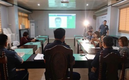 <p><strong>DIGITAL FACIAL COMPOSITE SKETCH.</strong> The Pangasinan Police Provincial Office (PPPO), headed by Col. Redrico Maranan (middle) as acting provincial director, demonstrates before the media the use of the digital facial composite sketch, which it will start using in identifying suspects in a crime. Maranan said the digital sketch is faster and more accurate compared to pencil and paper sketch.<em> (Photo courtesy of PPPO's Facebook page)</em></p>