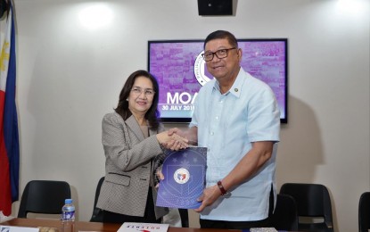 <p><strong>PHOTO CAPTION</strong>: Social Security System (SSS) Chairwoman and CEO Aurora C. Ignacio and Philippine Sports Commission Chairman William I. Ramirez sign the Memorandum of Agreement at the PSC Press Conference Room at the Rizal Memorial Sports Complex in Manila on Tuesday (July 30, 2019). Over 1,000 national athletes will now have SSS coverage.  <em>(PSC Photo)</em></p>