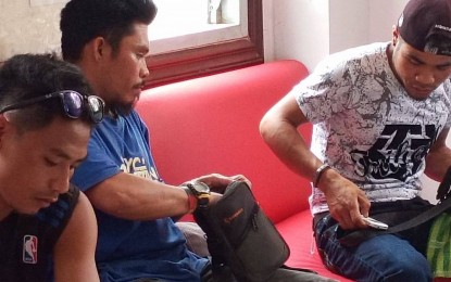 <p><strong>ARRESTED.</strong> The Police Regional Office (PRO-7) releases to Cebu media the photo of the three armed men arrested in Badian town, southwestern Cebu on Wednesday (July 31, 2019). PRO-7 Director Brig. Gen. Debold Sinas suspects the three as New People's Army members and among the terrorists who killed four cops in Ayungon, Negros Oriental last July 18. <em>(Photo courtesy of Badian Police Station)</em></p>