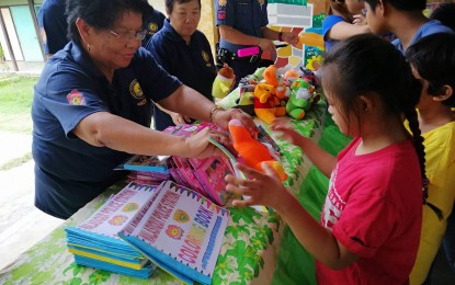 <p><strong>GIFT-GIVING AND FEEDING ACTIVITY.</strong> Some members of the Malasiqui Municipal Advisory Council and Malasiqui Police Station distributed on Wednesday (July 31, 2019) coloring books and toys to learners from the Malasiqui Central School with special educational needs. The activity is part of the Police Community Relations Month in July. <em>(Photo courtesy of Malasiqui Police Station)</em></p>
<p> </p>