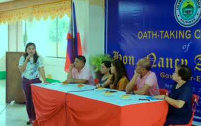 <p><strong>AIRPORT ISSUES.</strong> North Cotabato provincial legal officer Jonah Mineses (standing) discusses the problems surrounding the mothballed Central Mindanao Airport situated in M’lang town in a recent meeting with other local officials. Seated, left to right, are Provincial Administrator lawyer Nicholas Marasigan, Board Member Maria Krista Piñol-Solis, Governor Nancy Catamco, Board Member Onofre Respicio, and Provincial Planning and Development Officer Cynthia D. Ortega.<em> (File photo courtesy of North Cotabato PIO)</em></p>