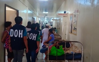 <p><strong>STATE OF CALAMITY. </strong>Health officials visit the Calbayog District Hospital in Samar crowded with dengue fever patients. The Samar Provincial Board approved the declaration of a state of calamity in the province as dengue fever cases continue to surge. <em>(Photo courtesy of Department of Health)</em></p>