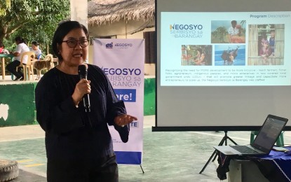 <p><strong>PROMOTING NEGOSYO SA BARANGAY. </strong>Department of Trade and Industry Acting Provincial Director Rosario Quodala tells participants about the latest updates on trade and industry promotion and development during the launching of 'Negosyo sa Barangay' in Adams, Ilocos Norte on Friday (Aug. 2, 2019). NSB aims to bring the DTI's services closer to people. <em>(Photo by Leilanie G. Adriano)</em></p>