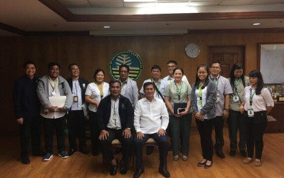 <p><strong>WATERSHED MANAGEMENT.</strong> National Irrigation Administration and Department of Environment and Natural Resources officials led by administrator Ricardo Visaya (seated, left) and Environment Secretary Roy Cimatu (seated, right) pose after signing a memorandum of agreement at the DENR Central Office in Diliman, Quezon City on Monday (Aug. 5, 2019).  The pact aims to effectively manage and develop the 143 watersheds in the country.  <em>(Contributed photo)</em></p>