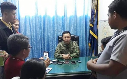 <p><strong>NEW TOP COP.</strong> Lt. Col. Joefel Siason is interviewed by the local media following his assumption as the new Koronadal City chief of police on Monday. <em>(Photo from the Koronadal City Police Facebook page)</em></p>
