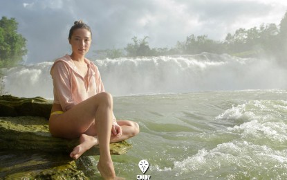 <p><strong>NATURAL BEAUTY</strong>. Actress Solenn Heussaff during a visit at the Lulugayan Falls in Calbiga, Samar in 2018. Promoting these tourism sites is part of the Samar Day celebration on August 11 under the Spark Samar campaign. <em>(Photo courtesy of Spark Samar)</em></p>
