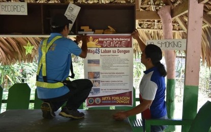 <p><strong>ANTI-DENGUE DRIVE.</strong> Village workers in Poblacion, Burgos, Ilocos Norte put up health advisory on dengue prevention at a waiting shed and other public areas in the community. The intensified drive against dengue is in response to the Department of Health's declaration of national dengue epidemic. <em>(Photo courtesy of Joegie Jimenez)</em></p>