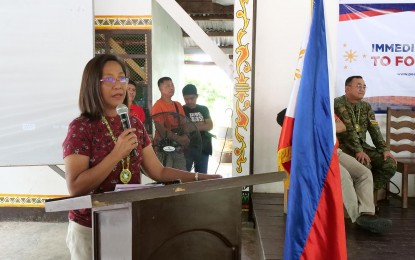 <p><strong>GOOD DECISION.</strong>  Mayor Maria Theresa Timbol of Asuncion, Davao del Norte delivers a speech during the turnover of the government’s assistance to former communist rebels at the 60th Infantry Battalion camp here on Tuesday (Aug. 6, 2019). Timbol said the decision of the former New People’s Army members will not be wasted as the government continues to provide basic services and to bring development even to the far-flung communities of the country. <em>(OPAPP photo)</em></p>