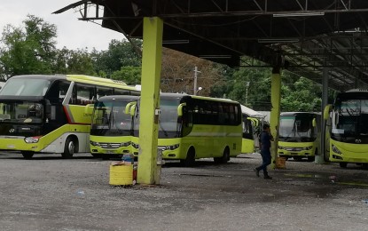 <p><strong>BUS TERMINAL.</strong> Ceres buses remained at the south terminal of Vallacar Transit Inc. on Lopez Jaena St. in Bacolod City on Wednesday after it was announced that trips have been cancelled as policemen were deployed to secure the terminal. <em>(Photo by Nanette L. Guadalquiver)</em></p>
<p> </p>