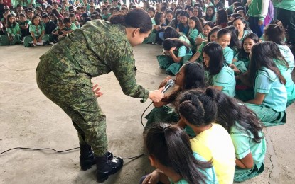 <p><strong>PROTECTING THE YOUTH.</strong> 1st Lt. Hazel Joy Durotan, Civil Military Operations officer of the Philippine Army's 61st Infantry Batallion, leads the conduct of the peace symposium and insurgency awareness in a high school in Iloilo province. Lt. Col. Joel Benedict Batara, commander of the 61st IB on Saturday (August 10, 2019), said the Army intensifies its effort to guard the youth against recruitment by the Communist Party of the Philippines-New People's Army (CPP-NPA).<em> (Photo courtesy of 61IB)</em></p>