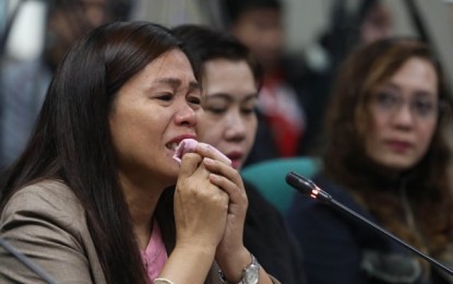 <p><strong>MOTHER’S PAIN.</strong> Luisa Espina, mother of a minor who was believed recruited by a communist-linked group, says her daughter stopped going home during the second semester of 2017. During a Senate hearing on missing minors on Wednesday (Aug. 7, 2019), Espina said she was not losing hope that someday, she will be reunited with her daughter. <em>(PNA file photo by Avito Dalan)</em></p>