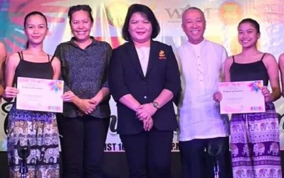 <p><strong>CULMINATION.</strong> National Commission for Culture and the Arts Deputy Executive Director Marichu Tellano (center) with Fr. Tito Soquiño (2nd from right), vice president for Student Affairs and External Relations of Colegio San Agustin-Bacolod; and Tanya Lopez (2nd from left), president of West Visayas Museum Association Inc., pose for a photo during the culmination ceremony for the HANAS: Scholarship Program in Culture and the Arts. With them during the event held at the CSA-Bacolod auditorium on Saturday (Aug. 10, 2019) are some of the HANAS scholars. <em>(Photo courtesy of PIA-Negros Occidental)</em></p>