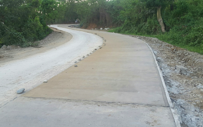 <p><strong>FARM-TO-MARKET ROAD</strong>. A total of 1,015 households or 5,096 residents from four barangays in Tabuk city, Kalinga will benefit from this 10-kilometer farm-to-market road. The project, under the Philippine Rural Development Project of the Department of Agriculture and funded by the national government through the DA, the World Bank and the provincial government of Kalinga, will let farmers to bring their coffee products to the market with ease. <em>(Photo courtesy of DA-PRDP)</em></p>