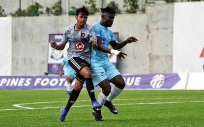 <p><strong>PFL ACTION</strong>. Jovin Bedic of Kaya Iloilo jocks for position against Joel Okono Green Archers United.  Kaya Iloilo won, 1-0, at the Aboitiz Pitch in Lipa City on Wednesday (Aug. 14, 2019). <em>(Contributed photo by Kaya FC Iloilo)</em></p>