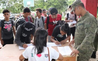 <p><strong>YOUTH SUMMIT.</strong> Students of Toboso National High School in Negros Occidental sign up for the Youth Leadership Summit organized by the 79th Infantry Battalion, covering the northern portion of the province, earlier this month. The activity, which is part of the Philippine Army’s Community Support Program, was attended by 75 participants. <em>(Photo courtesy of 79th Infantry Battalion, Philippine Army)</em></p>