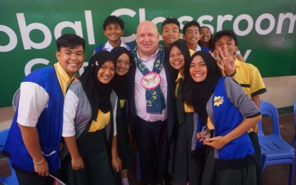 <p><strong>YOUNG LEADERS. </strong>New Zealand Ambassador to the Philippines David Strachan poses with delegates of the Global Classroom in Cotabato City High School in one of his visits in Cotabato City, Mindanao in June 2019. Strachan is set to reveal the eight young leaders who will participate in the four-month Mindanao Young Leaders Programme (MinYLP) on August 20. (<em>Photo courtesy: New Zealand Embassy in the Philippines)</em></p>