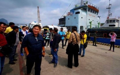 <p><strong>OCULAR VISIT</strong>. Transportation Minister Dickson Hermoso (in dark blue suit) of the Bangsamoro Autonomous Region in Muslim Mindanao (BARMM) inspects the Bongao port in Tawi-Tawi on Friday (August 16, 2019). Hermoso resolved the more than three years of confusion as to who is the real chief of MARINA-Tawi-Tawi. <em>(Photo courtesy of MOTC-BARMM)</em></p>