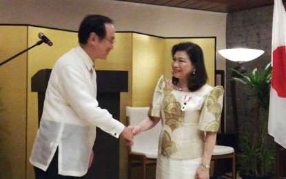 <p><strong>PINAY POWER</strong>. Japanese Ambassador to the Philippines Koji Haneda congratulates Ma. Elena Laurel-Loinaz after being conferred on Friday (Aug. 17) with the Order of the Rising Sun, Gold and Silver Rays for her contribution in bridging Tokyo and Manila relations. <em>(Photo by Joyce Rocamora)</em></p>