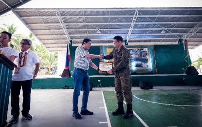 <p><strong>NEW FACILITIES.</strong> Davao Oriental Governor Nelson Dayanghirang (left) leads the inauguration and turn-over of new facilities at the Philippine Army’s 701st Kagitingan Brigade headquarters in Sitio Magay, Barangay Don Martin Marundan, in Mati City on Monday. <em>(Contributed Photo from Davao Oriental PIO)</em></p>