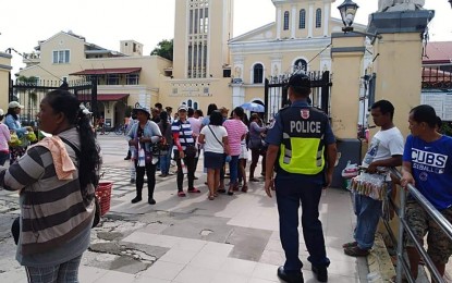 <p><strong>NORMAL ALERT STATUS.</strong> Police and soldiers are seen around the Minor Basilica of our Lady of Rosary of Manaoag on Sunday (August 18, 2019), despite the return to normal alert status, to ensure peace and order. The church is one of the most visited pilgrimage sites in Pangasinan. <em>(Photo courtesy of Manaoag Police Station)</em></p>
<p> </p>
<p> </p>