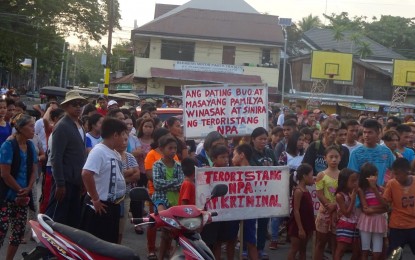 <p><strong>RALLY AGAINST THE 'REDS'.</strong> Residents of Hilongos, Leyte gather at the town center on Sunday (August 18, 2019) to express dismay over the presence of the New People's Army in their town. Locals staged the rally a few days after armed rebels killed the village chief of San Antonio. <em>(Photo courtesy of the Hilongos police station)</em></p>