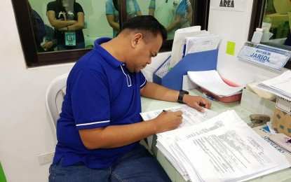 <p class="Body"><strong>DRUG TEST.</strong> South Cotabato Governor Reynaldo Tamayo Jr. fills up a form before undergoing a drug test at the provincial hospital in Koronadal City on Tuesday (August 20, 2019). The governor said the move is in line with efforts to make the Capitol a drug-free workplace. <em>(Photo from the Facebook page of the South Cotabato provincial government)</em></p>