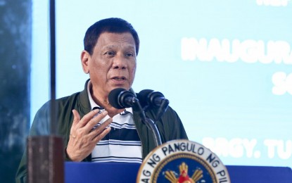 <p><strong>ANTI-CORRUPTION.</strong> President Rodrigo Roa Duterte delivers his speech during the inauguration of the Tumingad Solar Power Project in Odiongan, Romblon on August 21, 2019. Duterte vowed to go after the corrupt workers of the Bureau of Internal Revenue.<em> (Richard Madelo/Presidential Photo)</em></p>