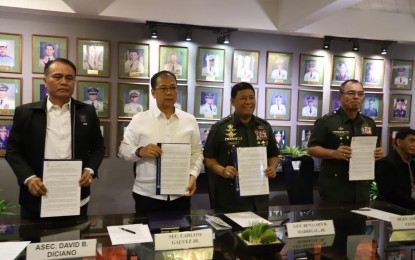 <p><strong>PEACEBUILDING PARTNERS.</strong> Officials of the Armed Forces of the Philippines (AFP) and Presidential Adviser on the Peace Process (OPAPP) agree on peace building after signing a memorandum of agreement on Aug. 22, 2019. From L-R: Assistant Secretary David Diciano, OPAPP Chief of Staff; Secretary Carlito G. Galvez Jr., Presidential Peace Adviser; General Benjamin Madrigal Jr., AFP Chief of Staff; and, Major General Andres C. Centino, AFP Deputy Chief of Staff for Operations, J3. <em>(OPAPP photo)</em></p>