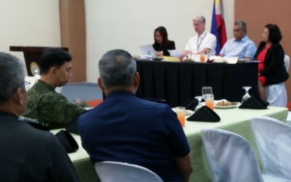 <p><strong>JOINT APPROVAL.</strong> Negros Occidental Governor Eugenio Jose Lacson (3rd from right) presides over the joint meeting of the Provincial Development Council (PDC) and the Provincial Peace and Order Council (PPOC) at the Capitol-owned Negros First Residences on Tuesday (Aug. 27, 2019). The two bodies unanimously approved a joint resolution for the creation of the Provincial Task Force on Ending Local Communist Armed Conflict. <em>(Photo by Nanette L. Guadalquiver)</em></p>