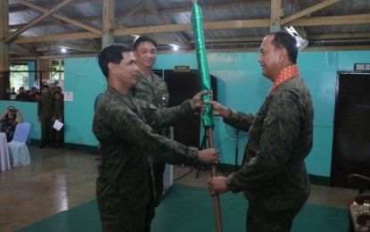 <p><strong>CHANGE OF COMMAND.</strong> Col. Noel T. Baluyan, former chief of the Task Group Cebu, receives the unit heraldry from Maj. Gen. Dinoh Dolina, commander of the 3rd Infantry "Spearhead" Division, as he assumes post as new commander of the 302nd Infantry "Achiever" Brigade in a change of command ceremony at the Camp Leon Kilat in Tanjay, Negros Oriental on Tuesday (Aug. 27. 2019). Baluyan vowed to work aggressively with the stakeholders in addressing security concerns in his area of jurisdiction. <em>(Photo contributed by Capt. Daffy Tawantawan)</em></p>