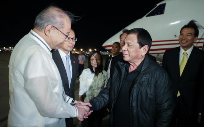 <p><strong>BEIJING TRIP.</strong> President Rodrigo Roa Duterte receives a warm welcome from Philippine Ambassador to the People's Republic of China Jose Sta. Romana upon his arrival at the Beijing Capital International Airport in the People's Republic of China on August 28, 2019. <em>(Ace Morandante/Presidential Photo)</em></p>