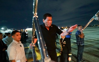 <p><strong>OFF TO BEIJING.</strong> President Rodrigo R. Duterte boards a plane bound for the People's Republic of China at the Villamor Air Base in Pasay City on August 28, 2019. Several key agreements are expected to be signed during Duterte’s five-day visit to Beijing. <em>(King Rodriguez/Presidential Photo)</em></p>