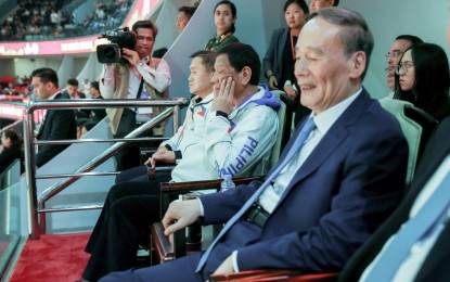 <p><strong>CHEERING FOR GILAS.</strong> President Rodrigo Roa Duterte is accompanied by the People's Republic of China Vice President Wang Qishan as he watches the basketball match of Gilas Pilipinas against Italy during the FIBA Basketball World Cup 2019 game at the Foshan International Sports and Cultural Center in Guangdong Saturday (Aug. 31, 2019). With the President is Senator Christopher Lawrence Go. <em>(Simeon Celi/Presidential photo)</em></p>