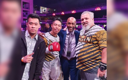 <p><strong>STILL UNDEFEATED. </strong> Undefeated Filipino bantamweight campaigner Raymart "Assassin" Gaballo poses with his handlers after stopping Colombian Yeison Vargas in the third round the Minneapolis Armory, Minneapolis, Minnesota, USA on Saturday (Aug. 31, 2019). The General Santos City native improved his unblemished ring record to 22-0.  <em>(Contributed photo)</em></p>