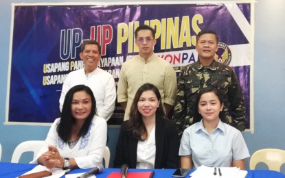 <p>Ako OFW Chairman, Dr. Chie Umandap (leftmost, standing) seeks police aid for OFW parents whose children are being recruited into communist groups, in a weekly forum of the Philippine Air Force Virtual TV's Usapang Kaunlaran, Usapang Pangkapayapaan (UP, UP) on Thursday (Aug. 29, 2019). In photo are (from left, standing) Umandap, Office of the Solicitor General Associate Solicitor Marlon Bosantog, Col. Gerardo Zamudio, (from left, sitting:) Alpha Phi Omega spokesperson Jane Pusing, Chief-of-Staff to the PCOO Legal Affairs Undersecretary, lawyer Tara Rama, and Air Force TV host Cherie Flores. <em>(PNA photo by Christine Cudis)</em></p>