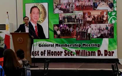 <p><strong>LAND USE ACT</strong>. Agriculture Secretary William Dar (in rostrum), proposes the enactment of a National Land Use Act to protect conversion of farmlands into other uses, in a forum with the Philippine Chamber of Agriculture and Food Inc. (PCAFI) held at the Quezon City Sports Complex on Saturday (Aug. 31, 2019). <em>(PNA photo by Lilybeth G. Ison)</em></p>