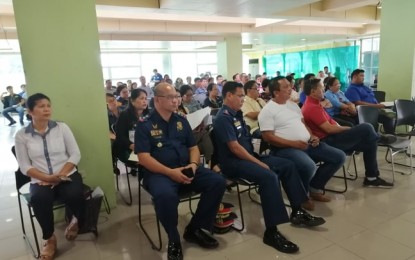 <p><strong>'DAGYAWAN SA BARANGAY'.</strong> The Negros Oriental Provincial Task Force to End Local Communist Armed Conflict (NOTF-ELECAC) headed by Governor Roel Degamo (in white shirt, front row) will hold the “Dagyawan sa Barangay: Talakayan ng Mamayan" (Open Government and Participatory Governance) and “Gobyerno Serbisyo Para sa Bayan” Caravan on Basic Government Services on Sept. 10 and 11, respectively, in Guihulngan town. In a meeting on Tuesday (Sept. 3, 2019), the group initially discussed security, logistics, and other concerns for the two-day activity to be held in cooperation with the Office of the Presidential Adviser for the Visayas.<em> (PNA photo by Judy Flores Partlow)</em></p>