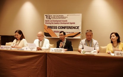 <p><strong>TALKING ABOUT GAD.</strong> NEDA Region 4-A Director and Calabarzon Regional Gender and Development Council (RGADC) Chairperson Luis G. Banua (center) answers questions from the media at the Bayleaf Hotel, General Trias City on Wednesday (September 4, 2019). Other panelists at the opening of the three-day 8th Calabarzon RGADC Convention are (from left to right) Philippine Commission on Women Director Maria Kristine Josefina G. Balmes, NEDA Undersecretary Jose Miguel R. Dela Rosa, Cavite State University president Dr. Hernando Robles and Cavite province's Gender and Development Focal Person Irene Bencito. <em>(PNA photo by Gladys S. Pino)</em></p>