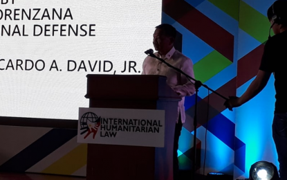 <p><strong>RULES OF WAR</strong>. Defense Undersecretary for Defense Policy Ricardo A. David Jr. delivers the message of Defense Secretary Delfin Lorenzana during the International Humanitarian Day 2019 celebrations at the Department of Foreign Affairs in Pasay City on Monday (Sept. 9, 2019). Lorenzana underscored the Philippines’ commitment to adhering to the international accepted norms or rules of conduct of war. <em>(PNA photo by Priam Nepomuceno)</em></p>