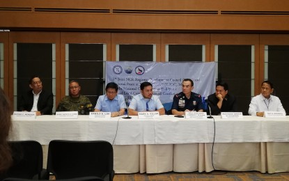 <p><strong>COUNTERING REDS. </strong>(From left) National Intelligence Coordinating Agency-NCR Rufino Mendoza, AFP JTF-NCR commander Brig. Gen. Alex Luna, MMDA chair Danilo Lim, DPWH Secretary Mark Villar, NCRPO chief Maj. Gen. Guillermo Eleazar, DILG Usec. Ricojudge Janvier Echiverri, and National Security Council assistant director Ray Roderos hold a press conference following the creation of the NCRTF-ELCAC which aims to counter activities of left-leaning groups in the capital through non-violent means. <em>(Photo by Raymond Carl dela Cruz)</em></p>