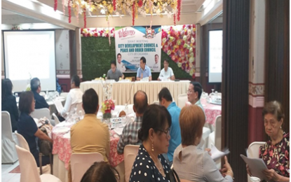 <p><strong>ADDRESSING LABOR UNREST IN ECOZONES.</strong> Calamba City Mayor Justin Marc SB Chipeco (center), chair of the City Peace and Order Council (CPOC) and City Development Council (CDC), presides over the joint council meeting, where a resolution was passed for the creation of the City Task Force to End Local Communist Armed Conflict (CTF-ELCAC), to address labor unrest agitated by the Communist Party of the Philippines-New People’s Army (CPP-NPA) terrorist group’s urban “legal fronts” in economic zones and industrial parks. Joining Chipeco during the joint council meeting at Dinghao Restaurant, Calamba City, Laguna on Sept. 10, 2019 are (L-R) City Councilor Angelito Lazaro, chair of the City Council’s Committee on Appropriation; and City Planning and Development Office (CPDO) head Dennis Lanzanas. (<em>PNA photo by Zen Trinidad)</em></p>