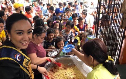 <p><strong>BEAUTY AND PURPOSE.</strong> New York’s Miss Republic Philippines International Excelsa de Jesus spends quality time with her chosen beneficiaries during her three-week series of charity events in the country. The young philanthropist aims to support other people who are less fortunate in life. <em>(Contributed Photo)</em></p>
