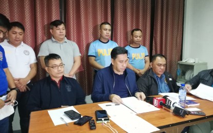 <p><strong>SPECIAL INVESTIGATION TASK GROUP. </strong>The special investigation task group for the ambush of ex-governor Amado Espino Jr. headed by Pangasinan Police Provincial Office director Col. Redrico Maranan (second from right) conducts a press briefing Wednesday (Sept.11) night for the update on the case. Two suspected get-away vehicles of the assailants were recovered hours after the ambush at Barangay Cobol San Carlos City and Barangay Pasima Malasiqui town. <em>(Photo by Hilda Austria)</em></p>