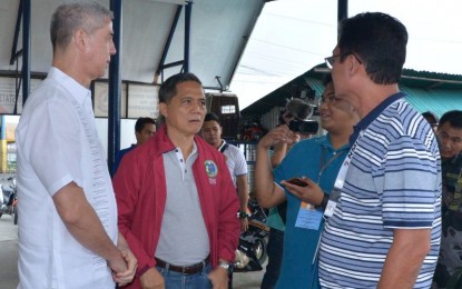 <p><strong>ASF WATCH.</strong> Governor Eugenio Jose Lacson (left) and Provincial Veterinarian Renante Decena (2nd from left), chair and co-chair of the Negros Occidental Provincial African swine fever (ASF) task force, respectively, during the inspection at the Bredco port in Bacolod City on Wednesday afternoon. Negros Occidental has banned the entry of all pork and pork products from Luzon which has confirmed cases of ASF. (Photo courtesy of PIO Negros Occidental)</p>