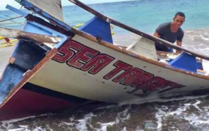 <p><strong>SALVAGED PART.</strong> A fisherman tries to save the damaged part of the fishing vessel M/L Sea Target that was destroyed by huge waves in Maguindanao on Thursday (Sept. 12). <em>(Photo courtesy of Barangay Nalkan chairman Moamar Manalao of Datu Blah Sinsuat, Maguindanao)</em></p>