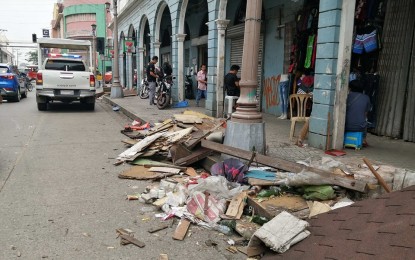 <p><strong>CLEARING OPERATIONS.</strong> Clearing operations led by the Anti-Squatting and Illegal Structures Division of the Public Safety and Transportation Management Office (PSTMO) in Iloilo City continue along the JM Basa and Aldeguer streets on Monday (Sept. 16, 2019). Love Joy Hosenilla, PSTMO chief, expressed confidence that they can beat the 60-day deadline for the clearing of national and local roads of obstructions. <em>(PNA photo by Joselito Villasis)</em></p>