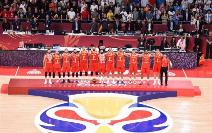 <p><strong>NEW CHAMPION</strong>. Team Spain celebrates during the awarding ceremony after the final match between Spain and Argentina at the 2019 FIBA World Cup in Beijing, capital of China on Sept. 15, 2019. Spain defeated Argentina, 95-75, for its first World Cup title since 2006. <em>(Xinhua/He Changshan)</em></p>