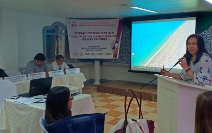 <p><strong>WAGE ADJUSTMENT CONSULTATION.</strong> Zenaida Angara-Campita, regional director of the Department of Labor and Employment (DOLE) in Central Luzon, leads one of the series of public consultations on the adjustment of wage rates for the minimum wage earners in Central Luzon. A public hearing on new wage adjustment will be conducted on Sept. 20, 2019.<em> (File photo by Regional Tripartite Wages and Productivity Board-3)</em></p>